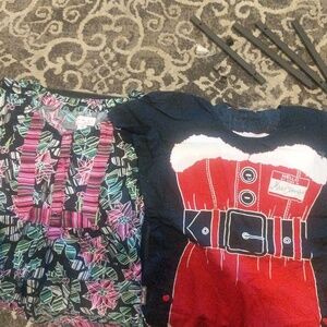Lot of 2 Koi scrub tops size xs.